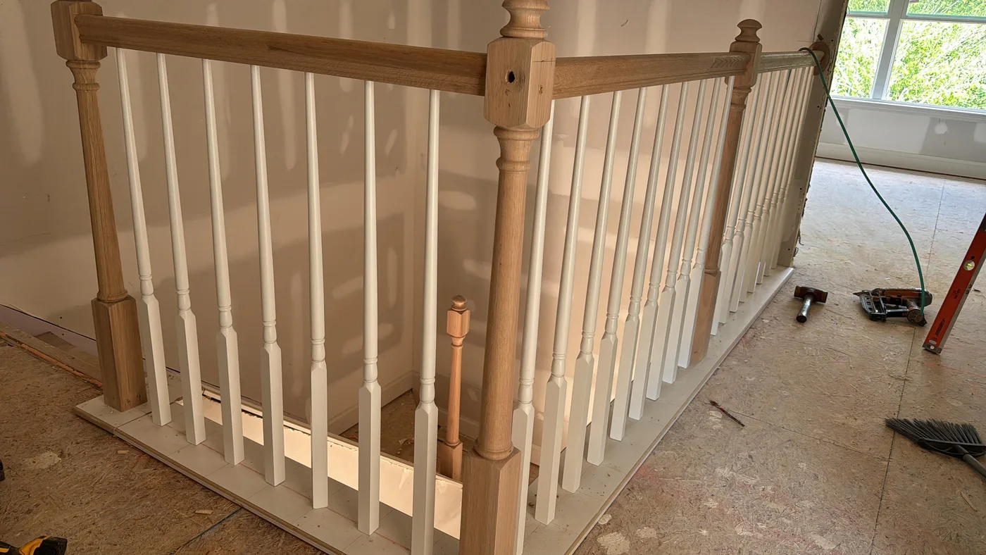 New railing built around a stair opening